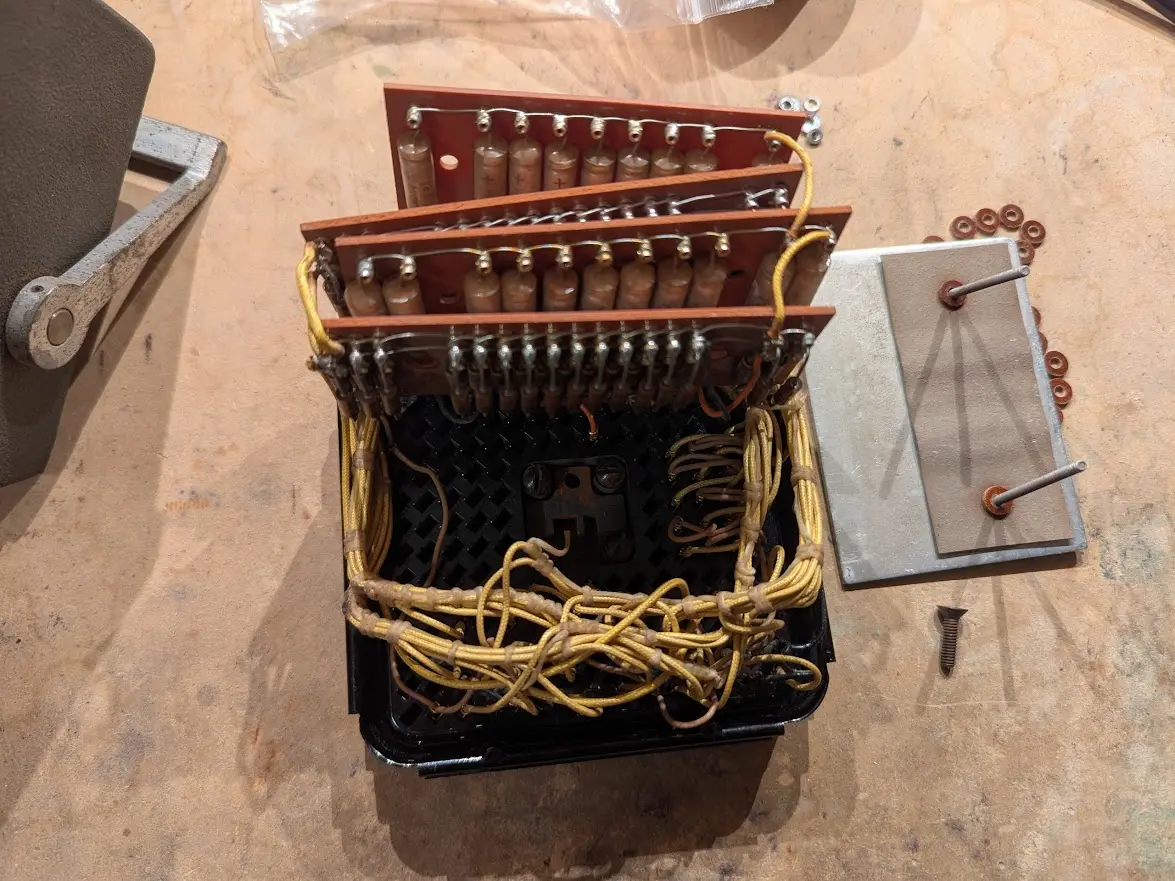 three circuit boards with resistors and capacitors and a bunch of wiring