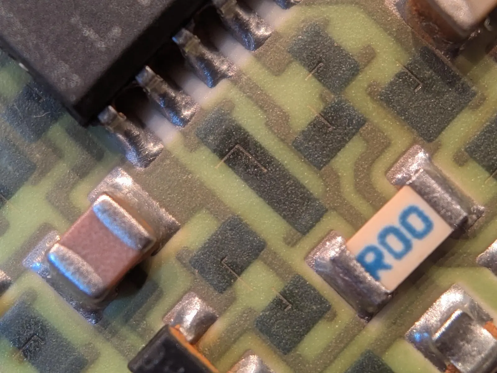L-shaped cuts in rectangular black carbon film resistors.