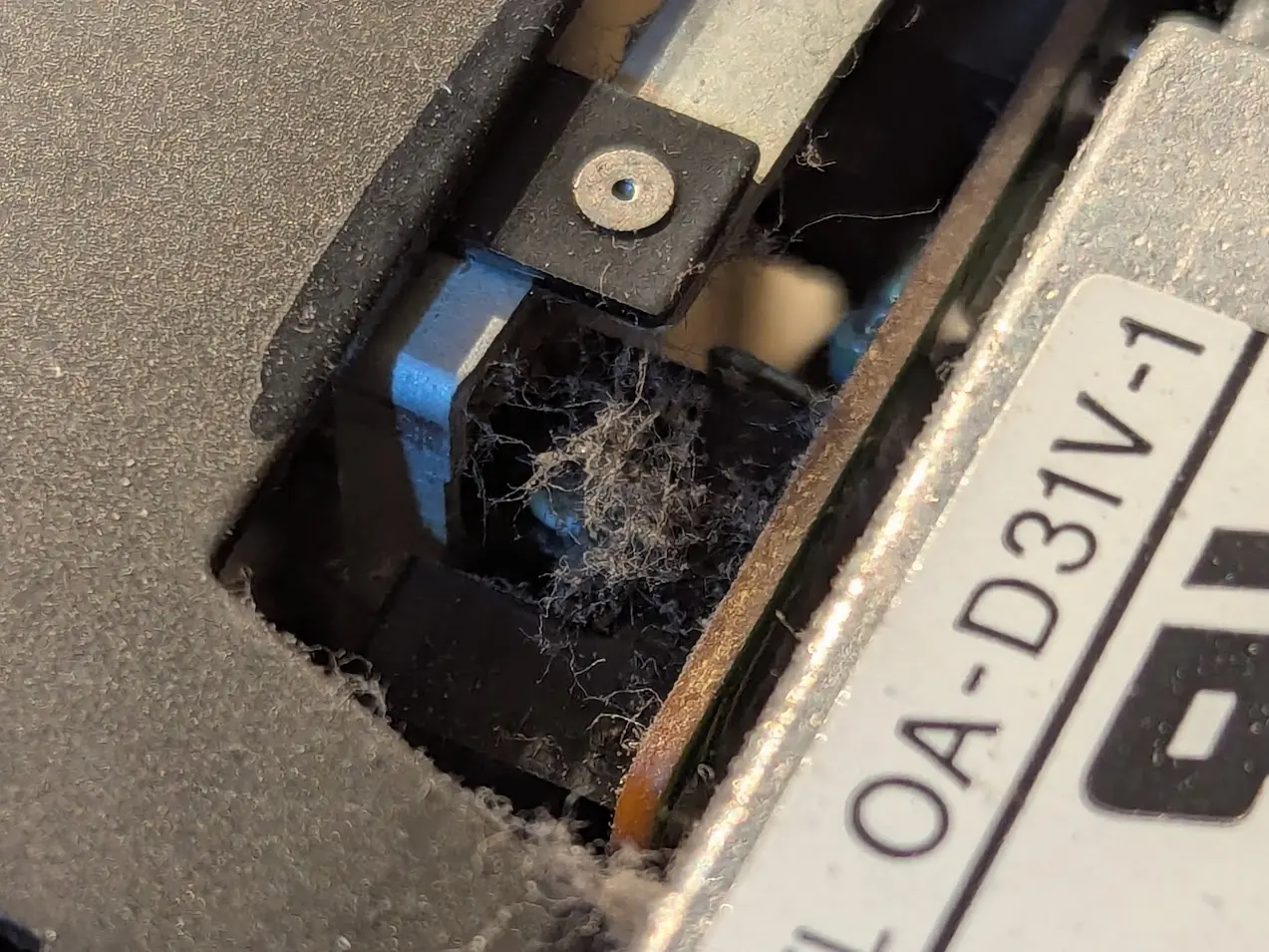 transmissive sensor with a big fat dust bunny squatting on it.