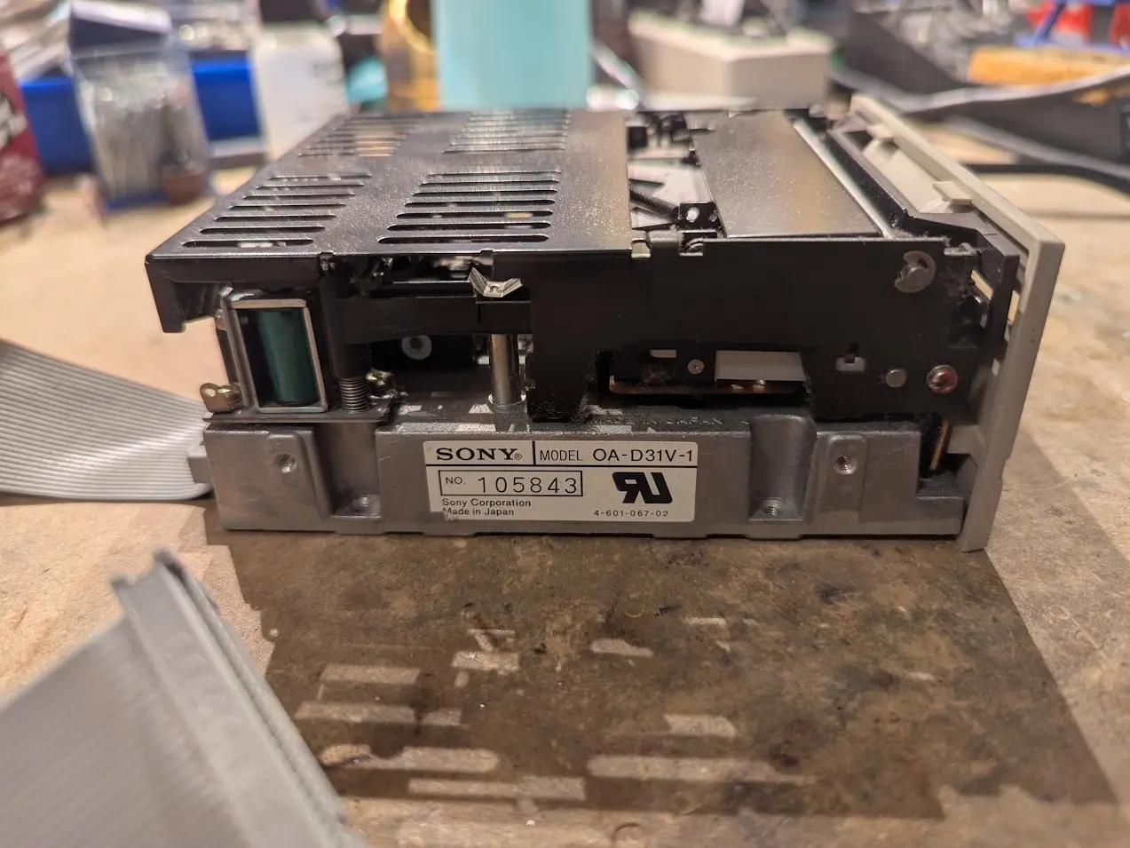 side view of the floppy drive with the Sony model number sticker. It's as tall as a half-height 5 1/4" drive, or somewhat taller than a standard 3.5" drive you might be familiar with.