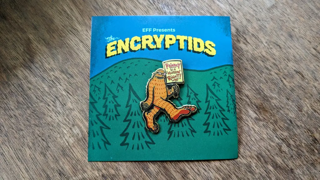 Add some whimsy to your suit with a privacy-minded Bigfoot pin 👣…